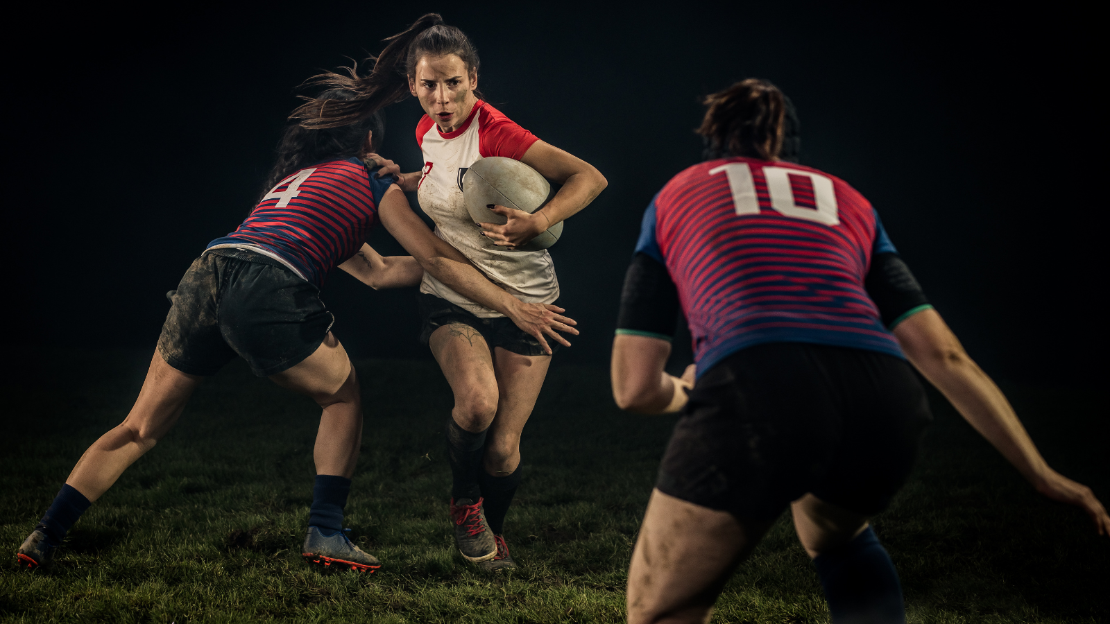 Women playing rugby