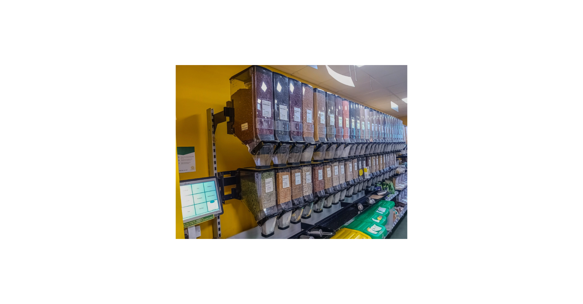 A zero waste store. Rows of dispensers of pulses, grains and nuts