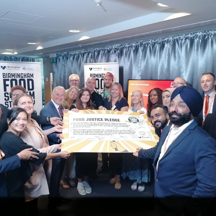 City leaders signing the Food Justice Pledge
