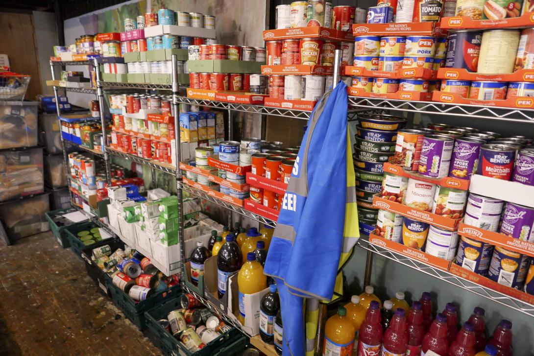 Food-bank-shelving-filled-with-donated-tinned-food-ready-for-distribution-1264978202_4928x3288-min.jpeg