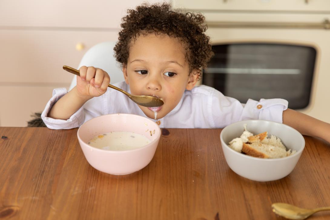 Child eating breakfast